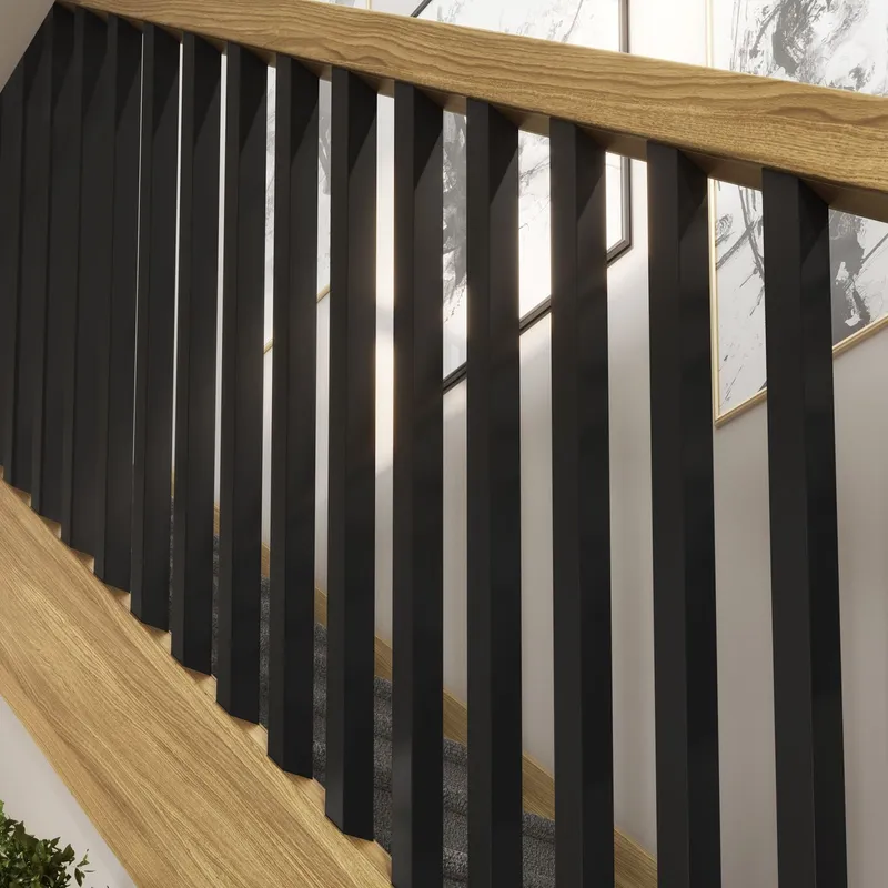 painted black pine spindles match with an oak handrail